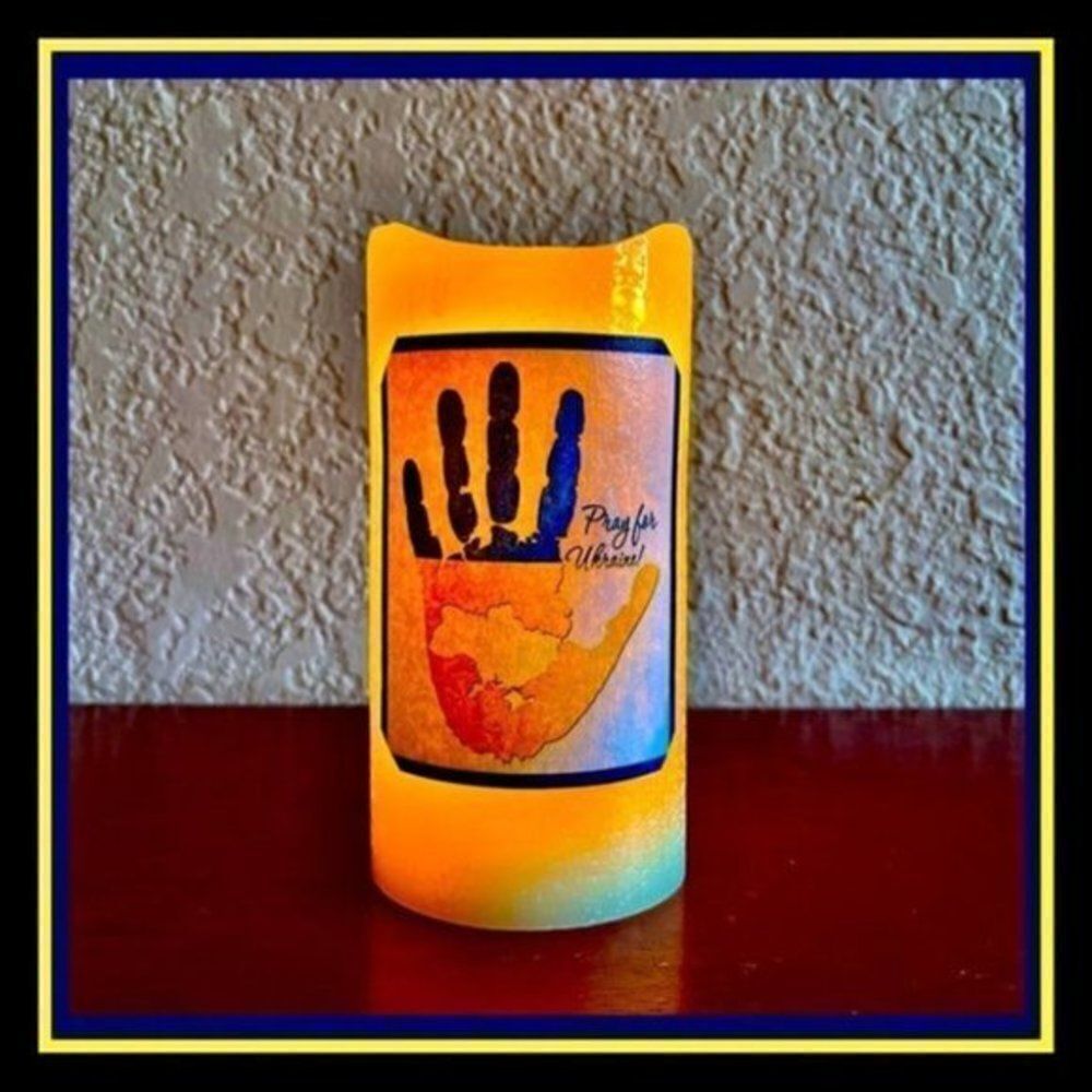NWOT. Pray for Ukraine Flameless Real Wax Candle w Timer. Explore Now!